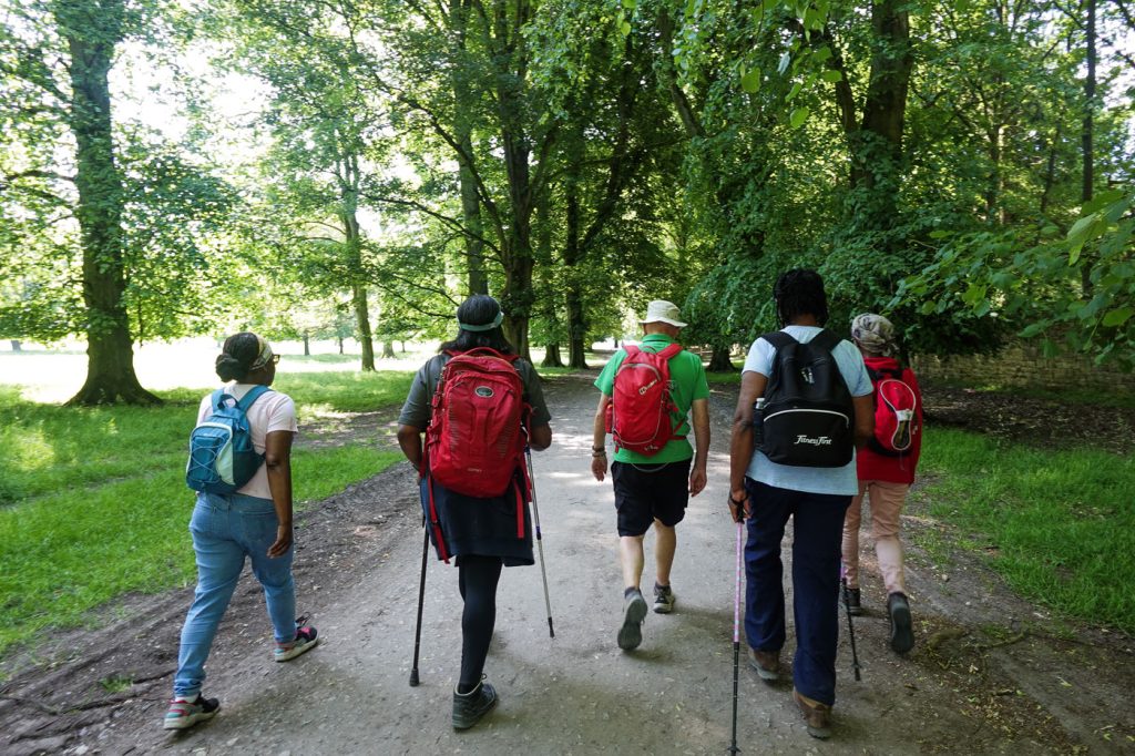 Walkers enjoying the shade during a Peak District Mosaic event